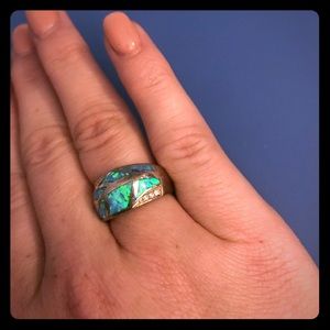 Genuine opal, sterling silver and CZ. Size 7